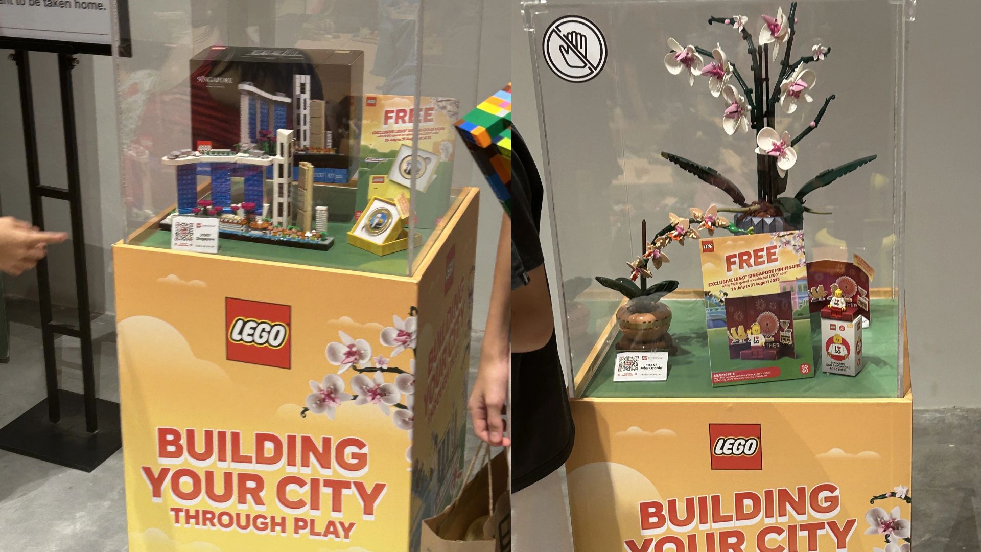 Display of LEGO Architecture Singapore set and LEGO Botanicals orchid sets with promotional materials