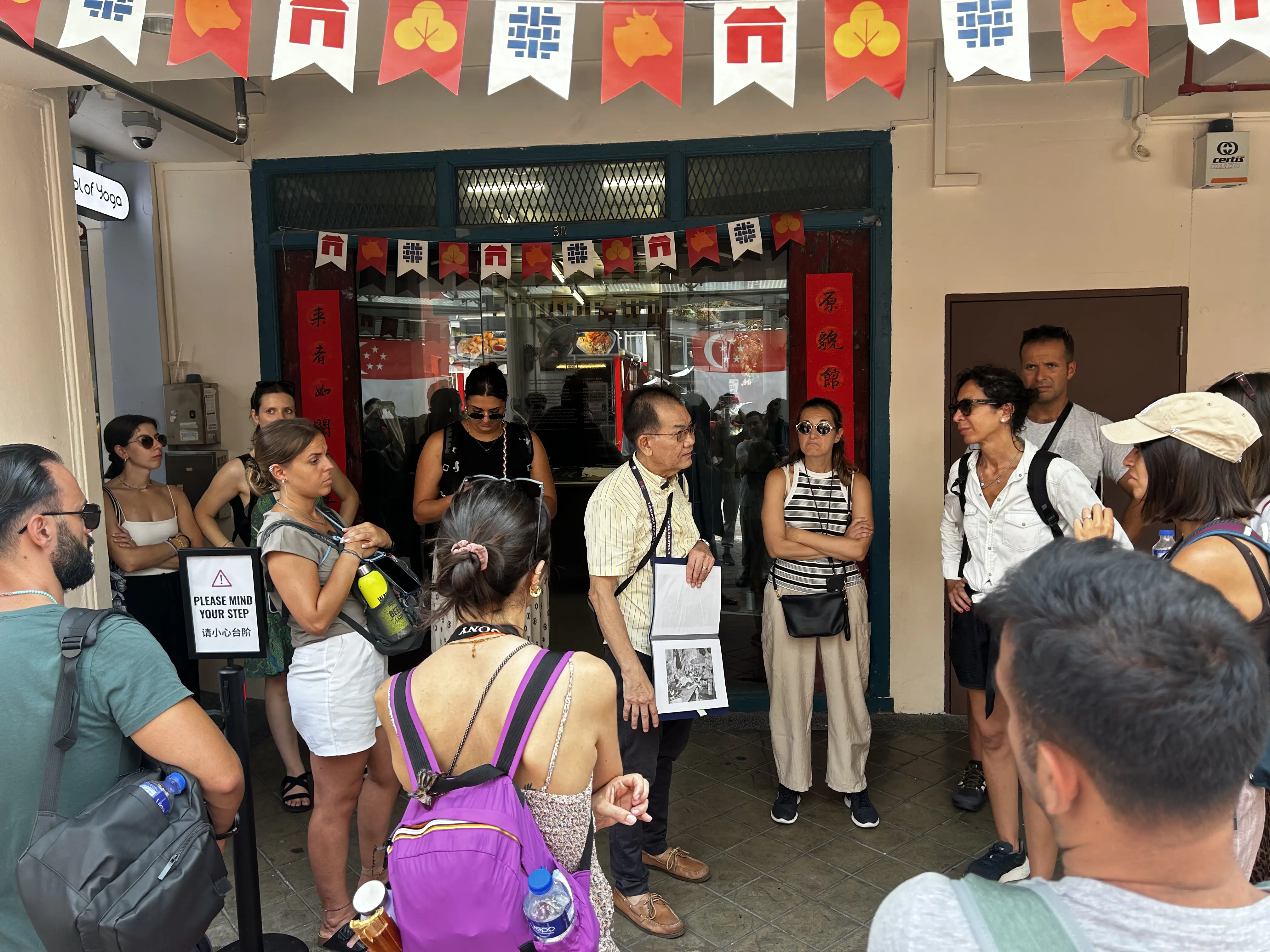 Walking tour group outside Chinatown Heritage Centre